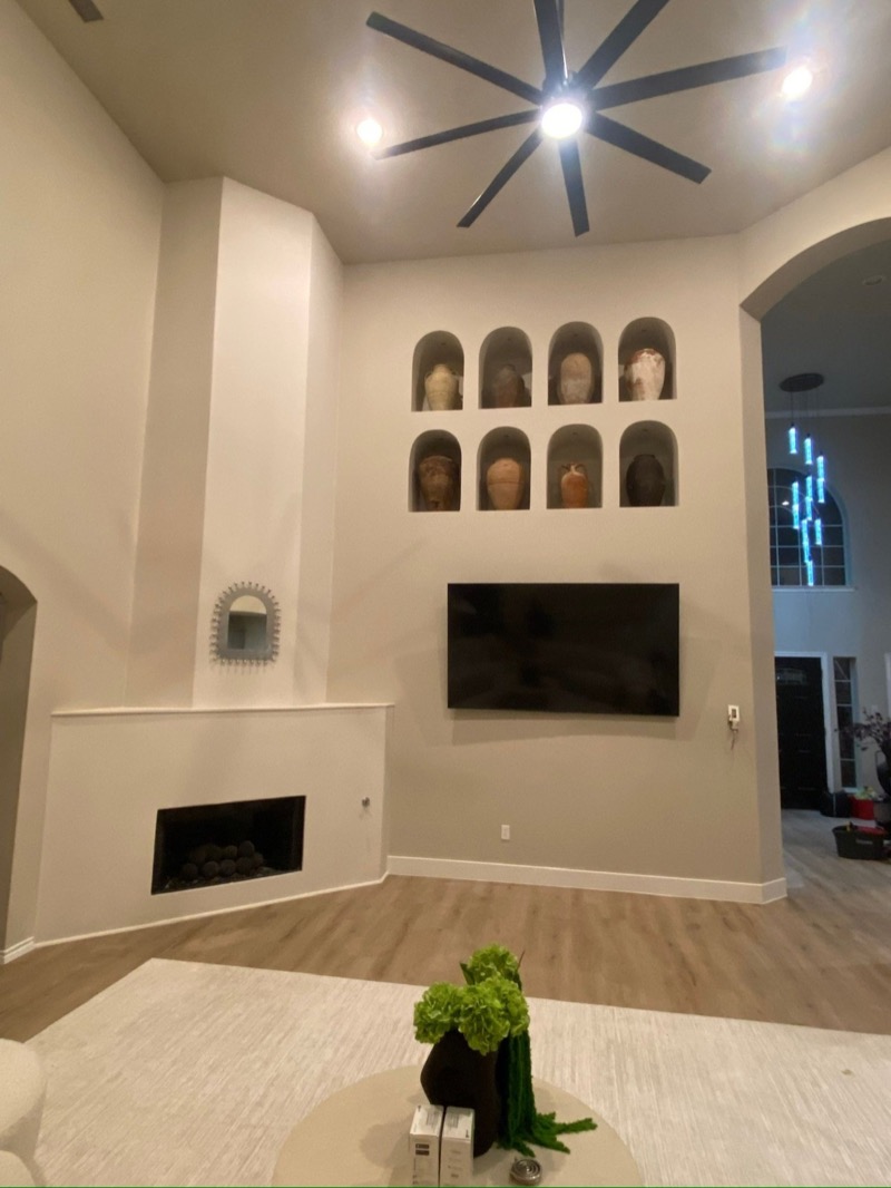 High Ceiling and TV Walls project by Lively Luxury Designs