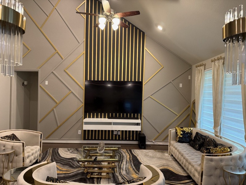 High Ceiling and TV Walls project by Lively Luxury Designs