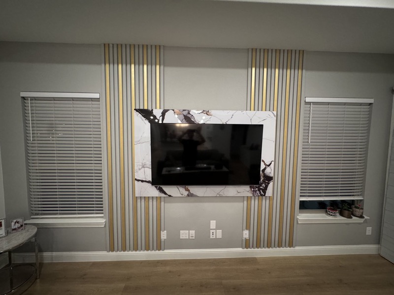 High Ceiling and TV Walls project by Lively Luxury Designs