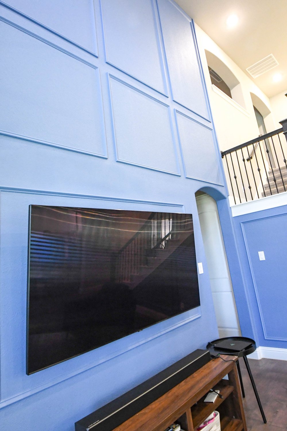 Close view of the panel grid behind the mounted TV