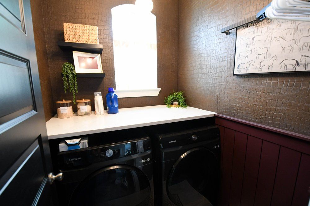 The counter, machines and burgundy wainscot from the doorway