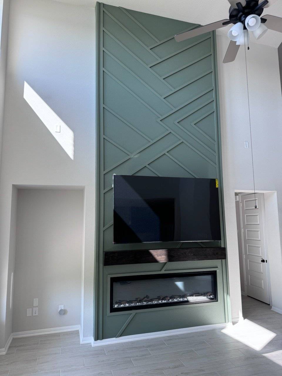 A remodeled fireplace by Lively Luxury Designs